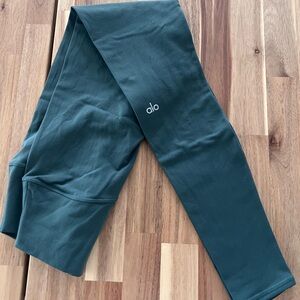 ALO Yoga High-Rise Leggings in clover green.
